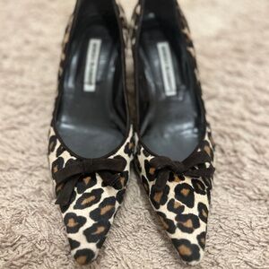 •Manolo Blahnik Pony-
hair Heels 8,5
